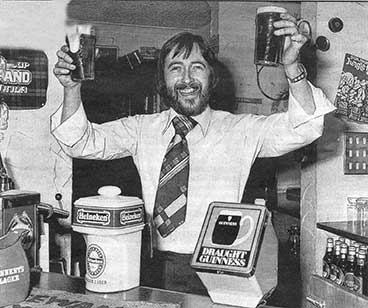 Image of Dougie Henderson behind the bar 1978.
